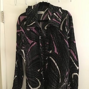 Very cute long bell sleeve blouse. W/lace up front